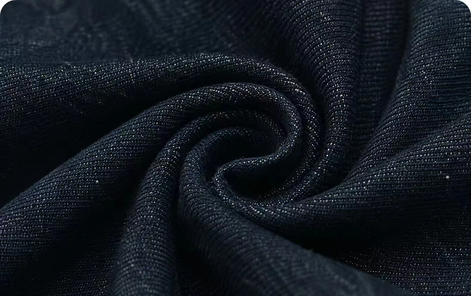 Close-up of premium denim fabric weave and texture